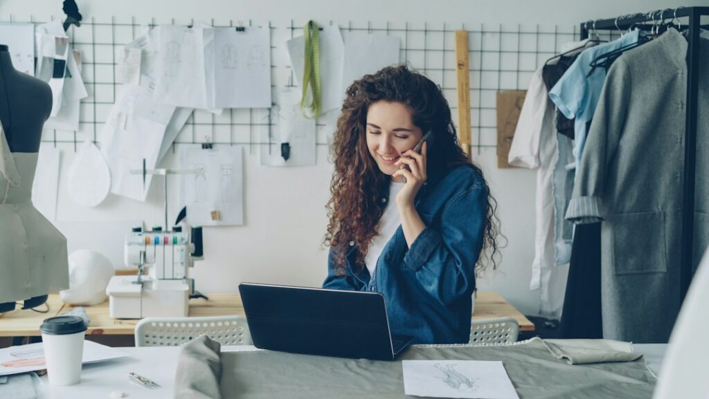 Small business owner reviewing marketing options on a laptop, weighing SEO against Google Ads